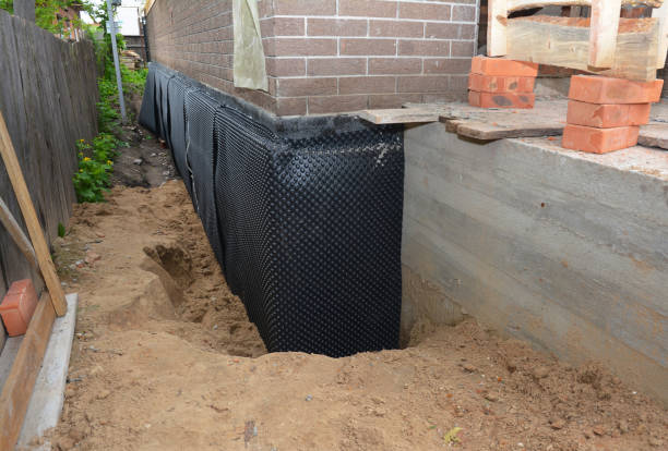 Happy homeowners after waterproofing job in Cheyney